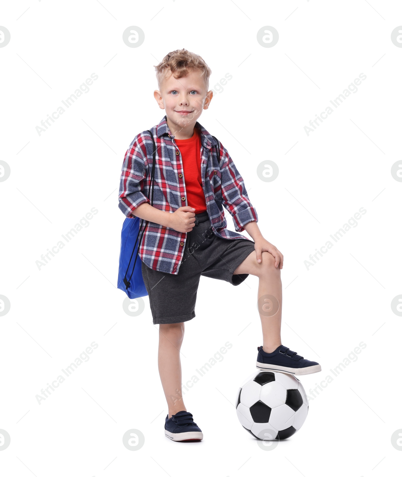 Little boy with soccer ball and sports string bag on white background Photo of Little boy with soccer ball and sports string bag on white background