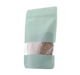 Photo of One zipper stand-up pouch with seeds isolated on white. Mockup for design