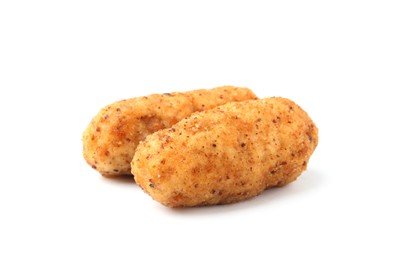 Photo of Tasty fried golden croquettes isolated on white
