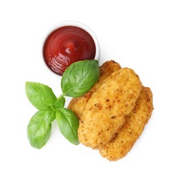 Photo of Tasty fried croquettes, basil and sauce isolated on white, top view