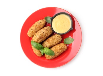 Photo of Tasty fried croquettes, basil and sauce isolated on white, top view