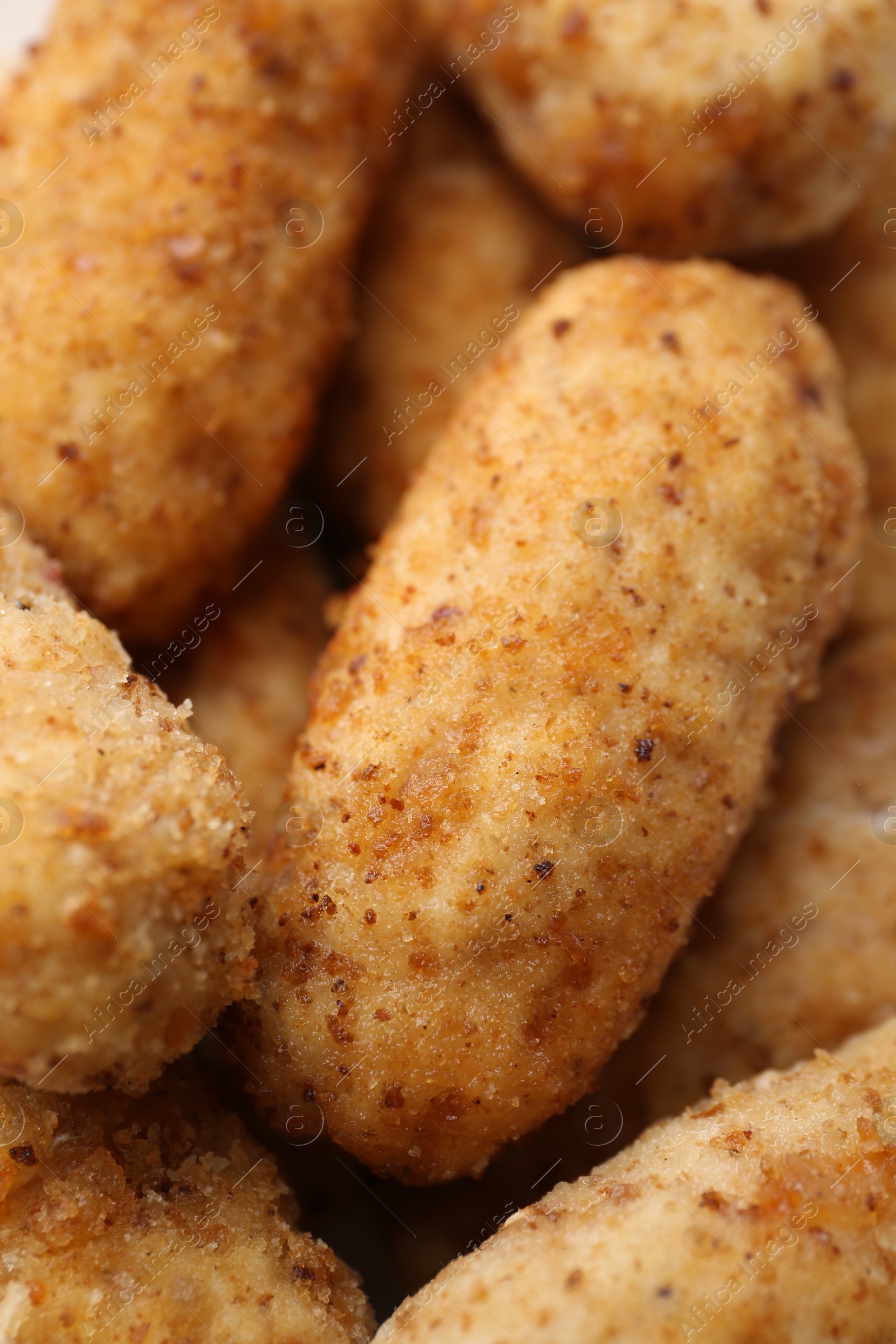 Tasty fried croquettes as background, closeup view Photo of Tasty fried croquettes as background, closeup view
