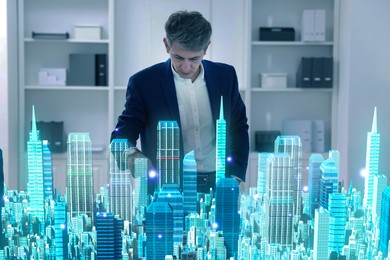 Illustration of Building information modelling. Man using holographic projection of city in office