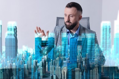 Illustration of Building information modelling. Man using holographic projection of city in office