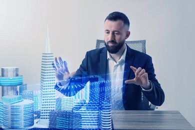 Illustration of Building information modelling. Man using holographic projection of city in office