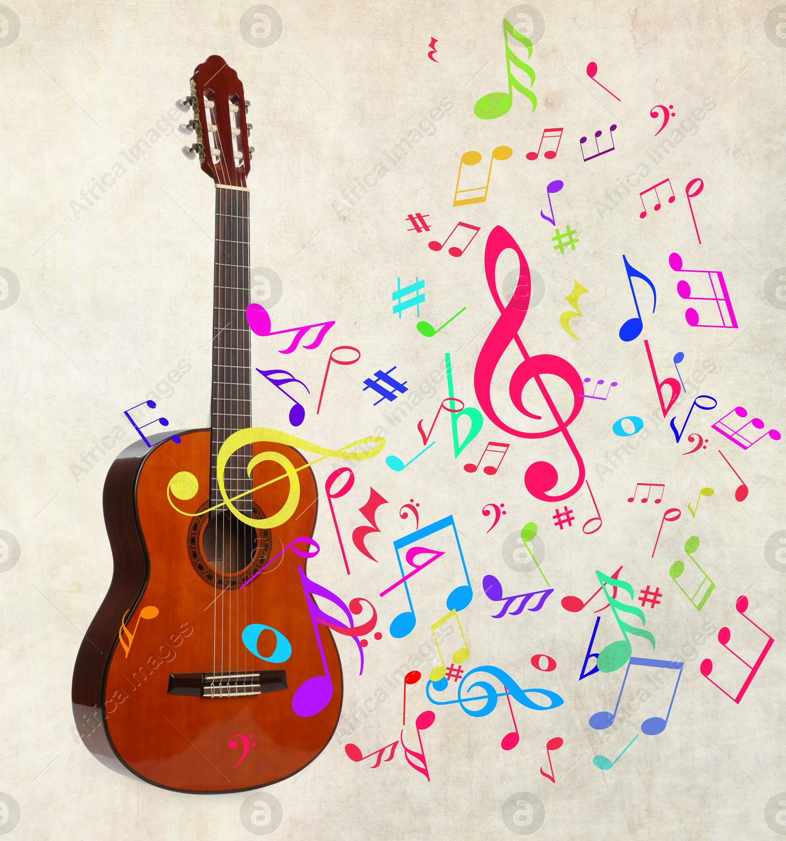 Acoustic guitar and colorful music notes on beige background Image of Acoustic guitar and colorful music notes on beige background