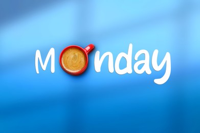 Image of Coffee will make Monday good. Cup of hot drink instead of letter O in word on blue background, top view