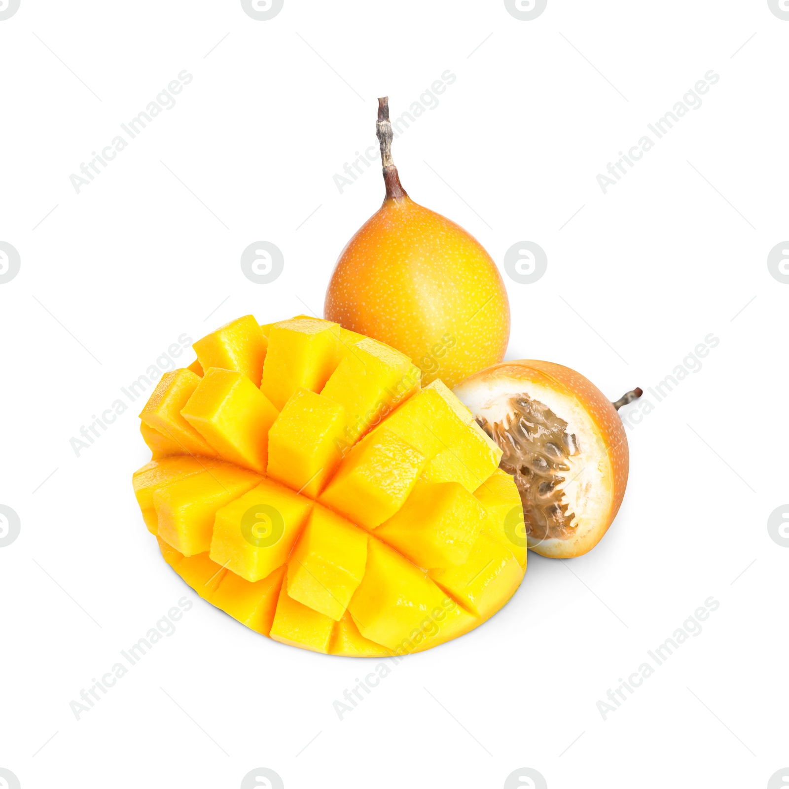 Fresh juicy mango cut in cubes and passion fruits isolated on white Image of Fresh juicy mango cut in cubes and passion fruits isolated on white