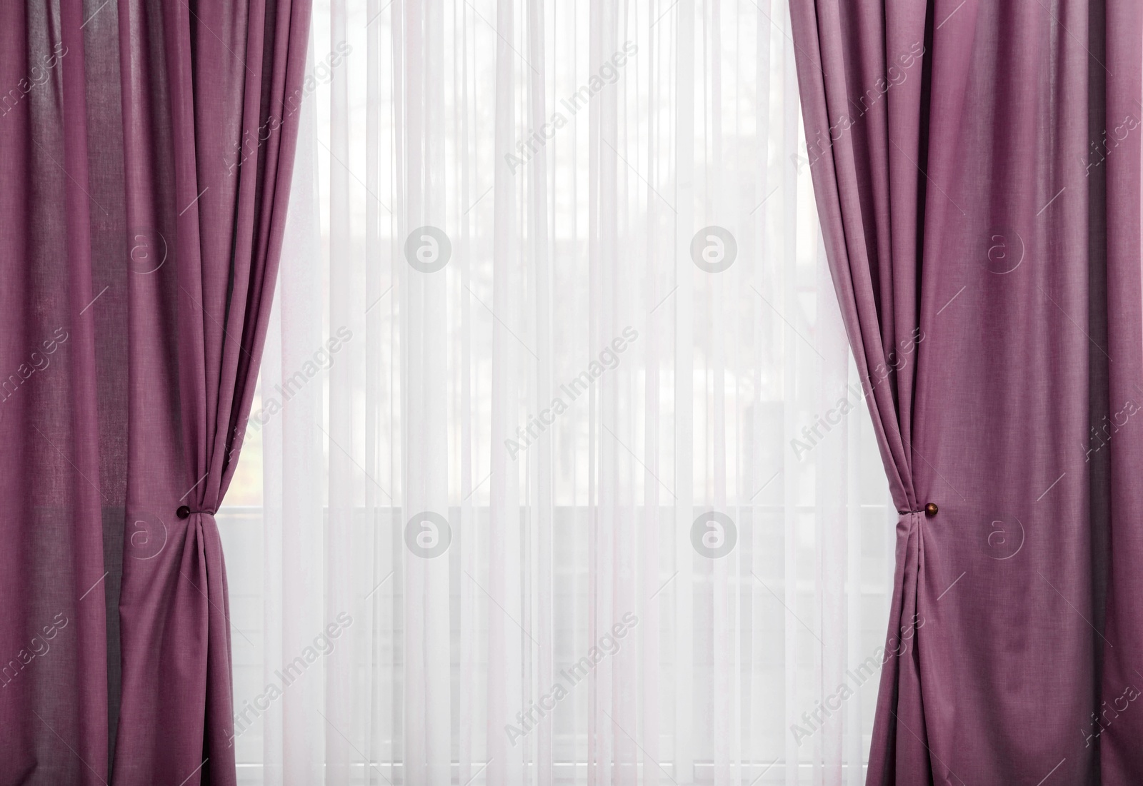 Window with beautiful red purple curtains. Interior design Image of Window with beautiful red purple curtains. Interior design