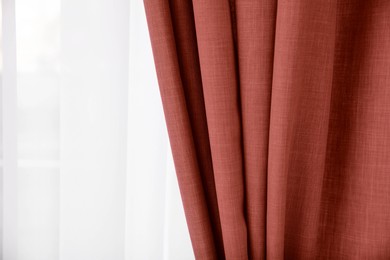 Image of Window with beautiful dark red curtains. Interior design