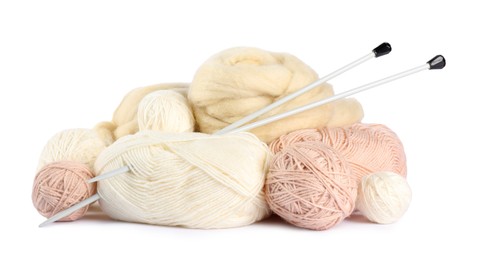Photo of Felting wool and knitting yarn with needles isolated on white