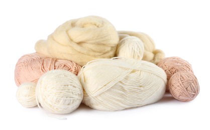 Photo of Felting wool and knitting yarn isolated on white