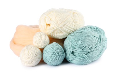 Photo of Felting wool and knitting yarn isolated on white