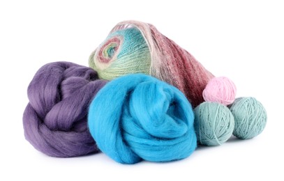 Photo of Felting wool and knitting yarn isolated on white
