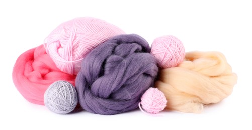 Photo of Felting wool and knitting yarn isolated on white