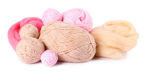 Photo of Felting wool and knitting yarn isolated on white