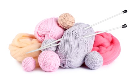 Photo of Felting wool and knitting yarn with needles isolated on white
