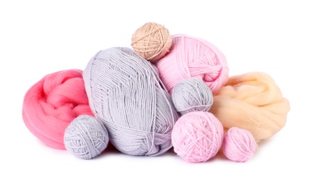 Photo of Felting wool and knitting yarn isolated on white