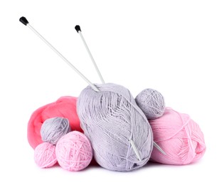 Photo of Felting wool and knitting yarn with needles isolated on white