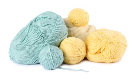 Photo of Colorful knitting yarn and felting wool isolated on white