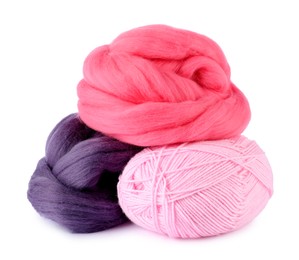 Photo of Felting wool and knitting yarn isolated on white