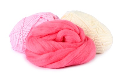 Photo of Felting wool and knitting yarn isolated on white