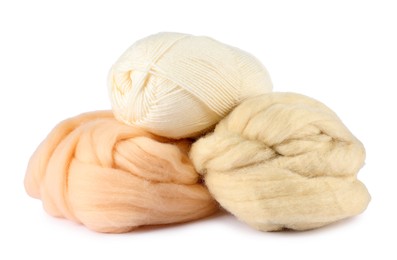 Photo of Felting wool and knitting yarn isolated on white