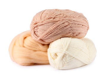 Photo of Felting wool and knitting yarn isolated on white