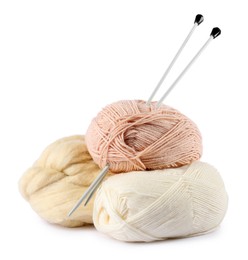 Photo of Felting wool and knitting yarn with needles isolated on white