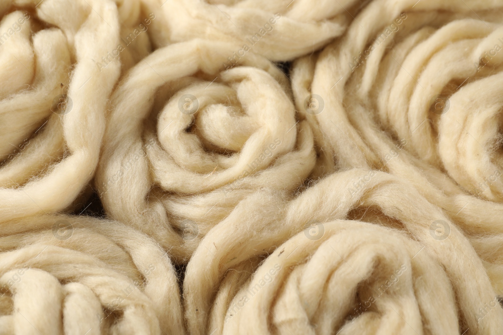 Natural felting wool as background, closeup view Photo of Natural felting wool as background, closeup view