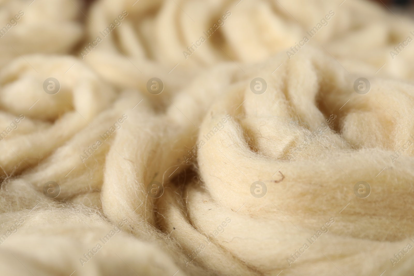 Natural felting wool as background, closeup view Photo of Natural felting wool as background, closeup view