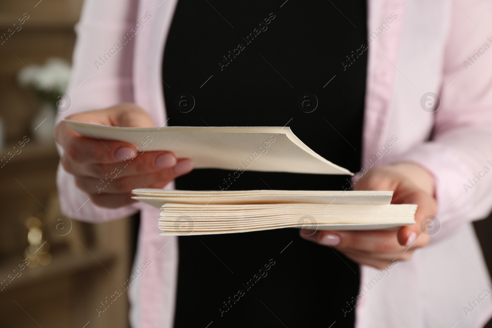 Woman with stack of letters indoors, closeup Photo of Woman with stack of letters indoors, closeup
