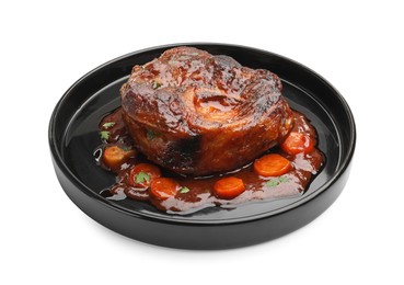 Photo of Tasty beef ossobuco with carrot, parsley and sauce isolated on white