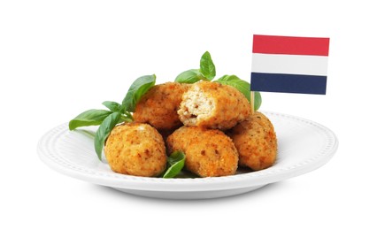 Photo of Tasty fried croquettes, flag of Netherlands and basil isolated on white