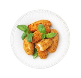 Photo of Tasty fried croquettes and basil isolated on white, top view