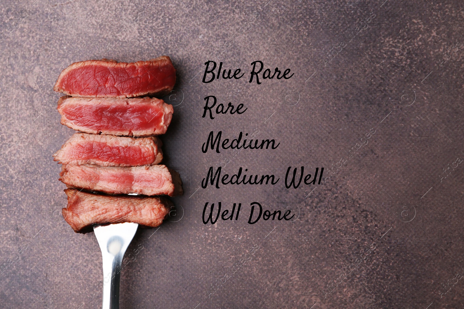 Pieces of delicious beef meat in different degrees of doneness on brown table, top view Image of Pieces of delicious beef meat in different degrees of doneness on brown table, top view