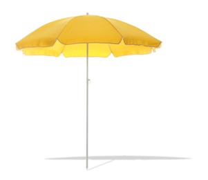 Image of Yellow beach umbrella casting shadow on white background