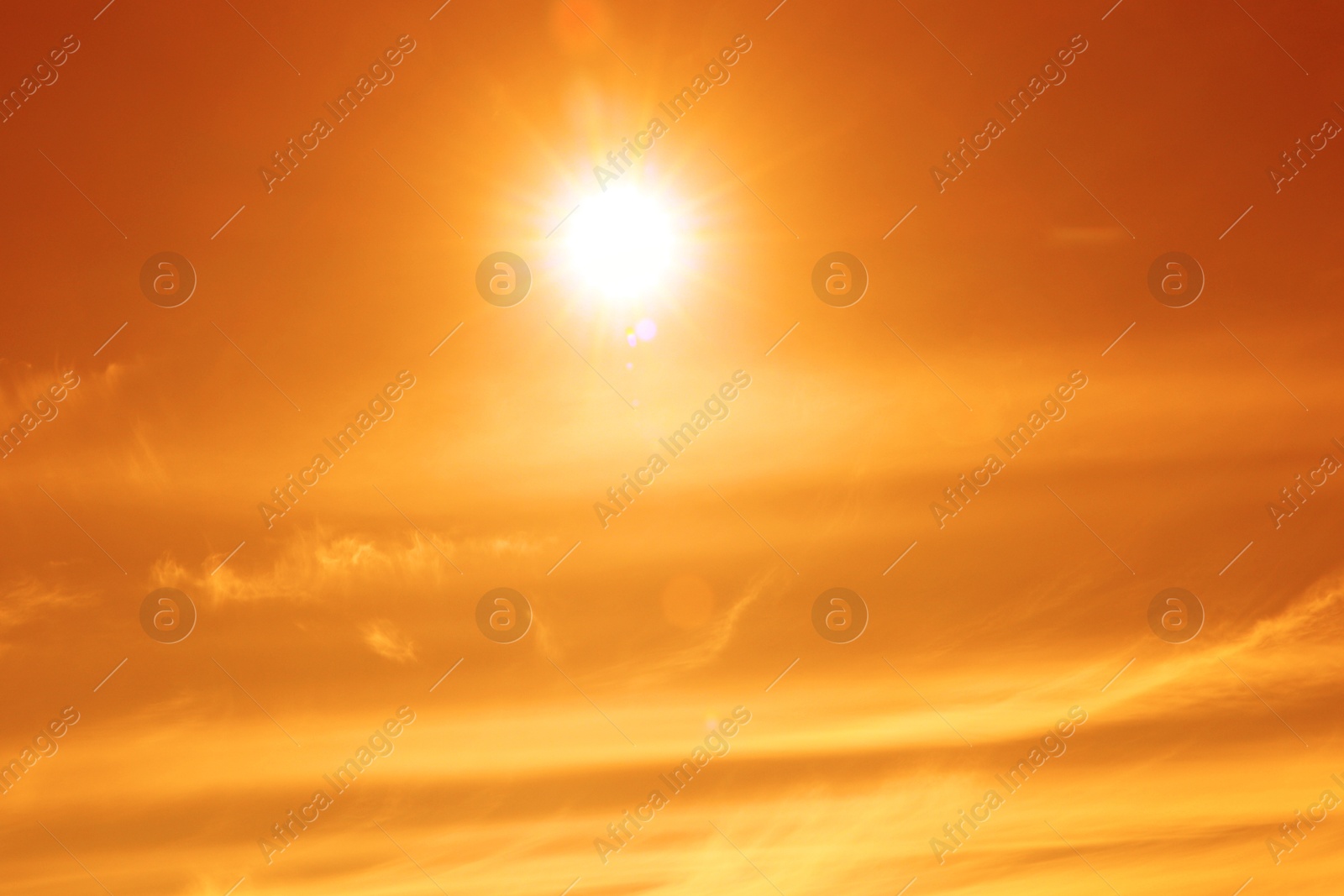 Orange sky with sun and clouds during hot summer weather. Extremely high temperature Image of Orange sky with sun and clouds during hot summer weather. Extremely high temperature