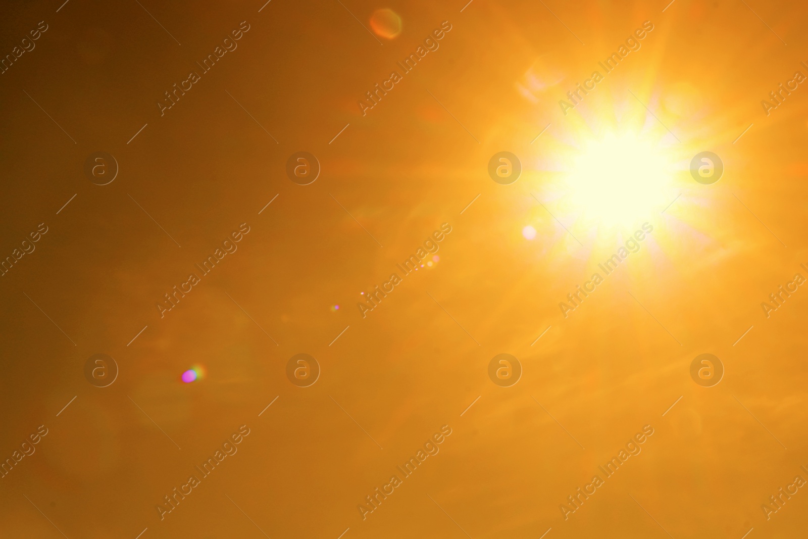 Bright sun in orange sky during hot summer weather. Extremely high temperature Image of Bright sun in orange sky during hot summer weather. Extremely high temperature