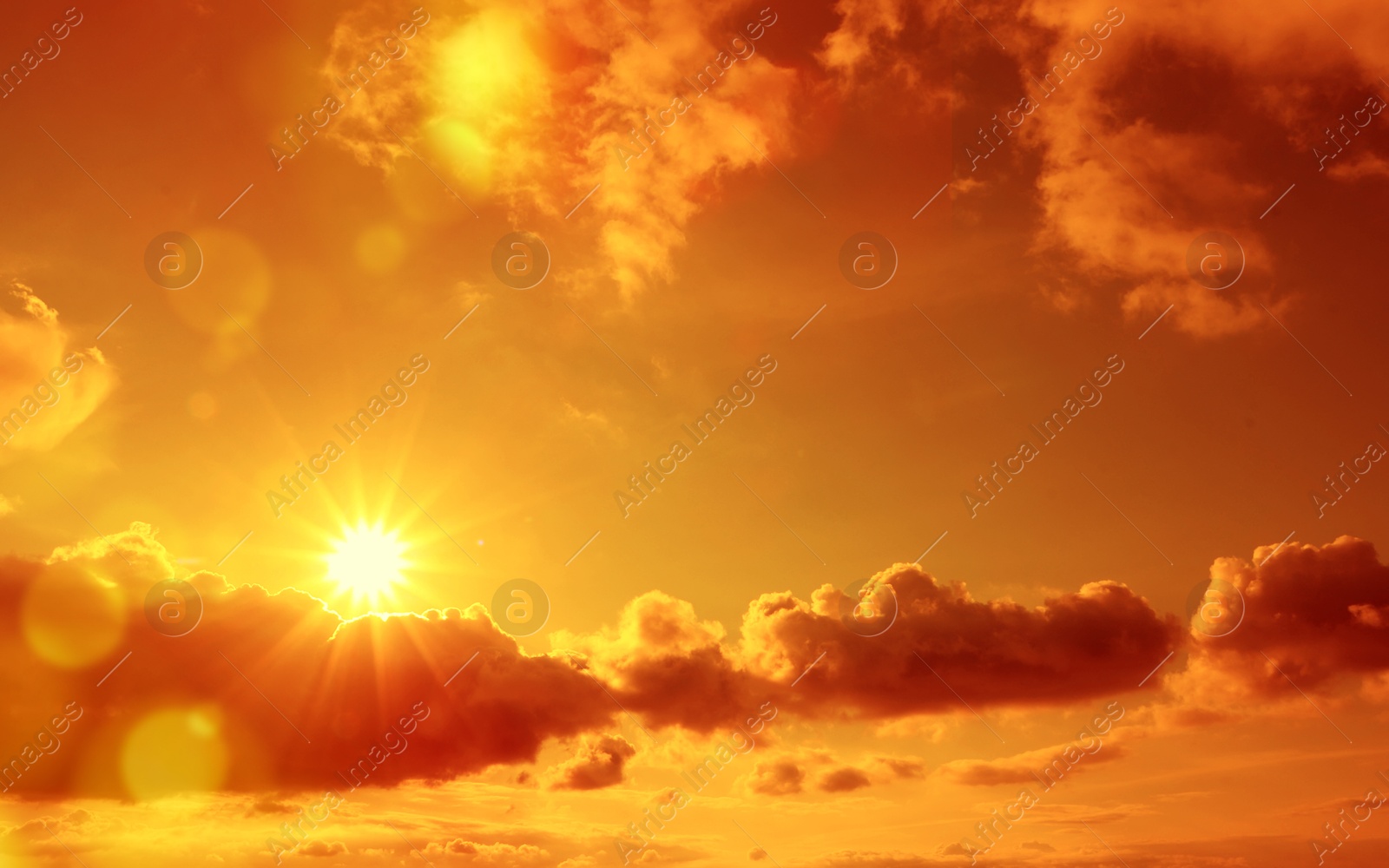 Orange sky with sun and clouds during hot summer weather. Extremely high temperature Image of Orange sky with sun and clouds during hot summer weather. Extremely high temperature