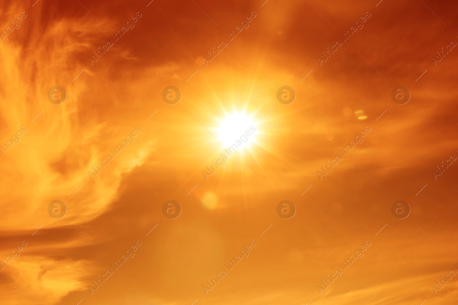 Orange sky with sun and clouds during hot summer weather. Extremely high temperature Image of Orange sky with sun and clouds during hot summer weather. Extremely high temperature