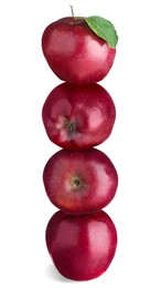 Image of Red apples stacked on top of each other against white background. Balance