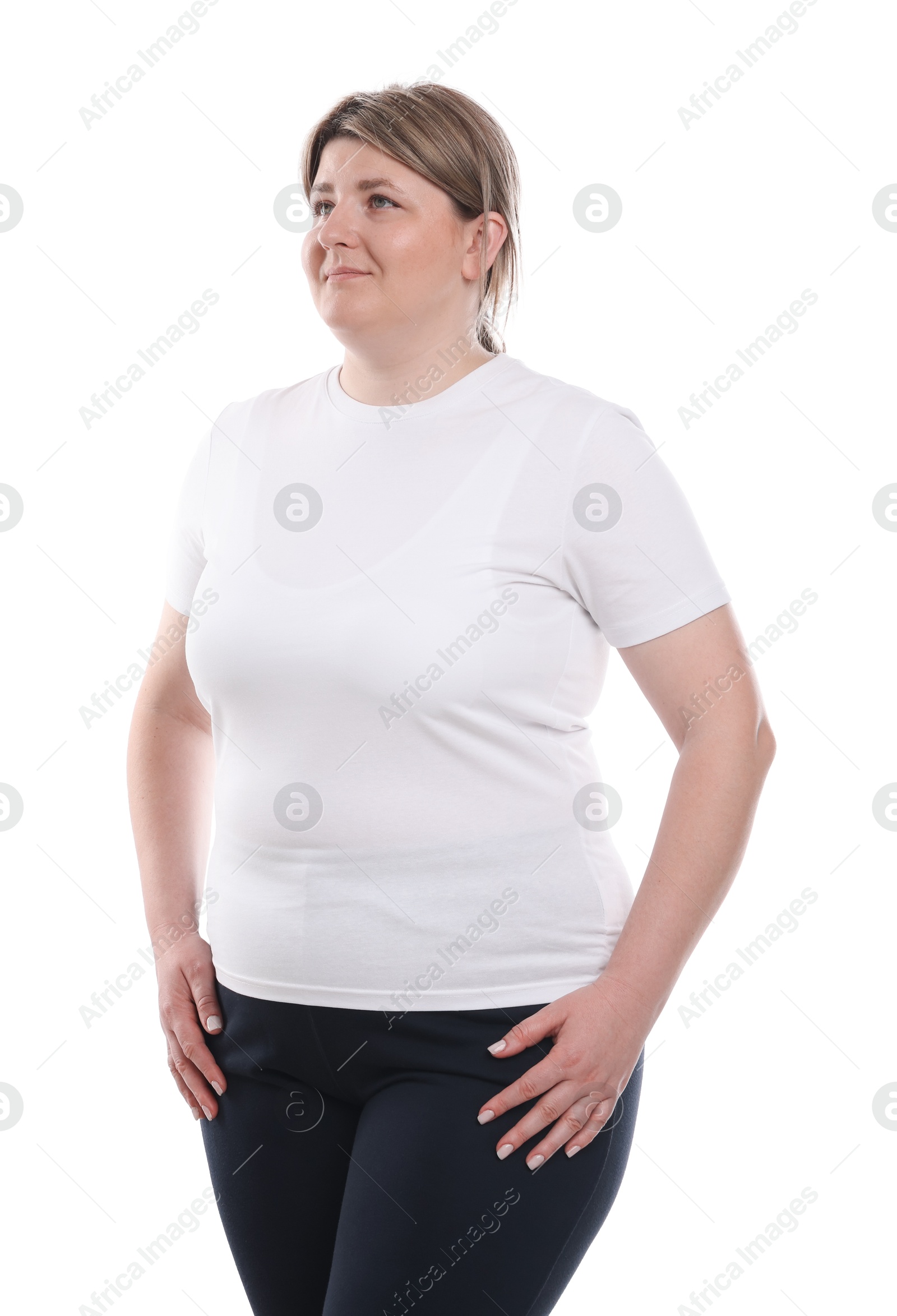 Weight loss. Plus size woman on white background Photo of Weight loss. Plus size woman on white background