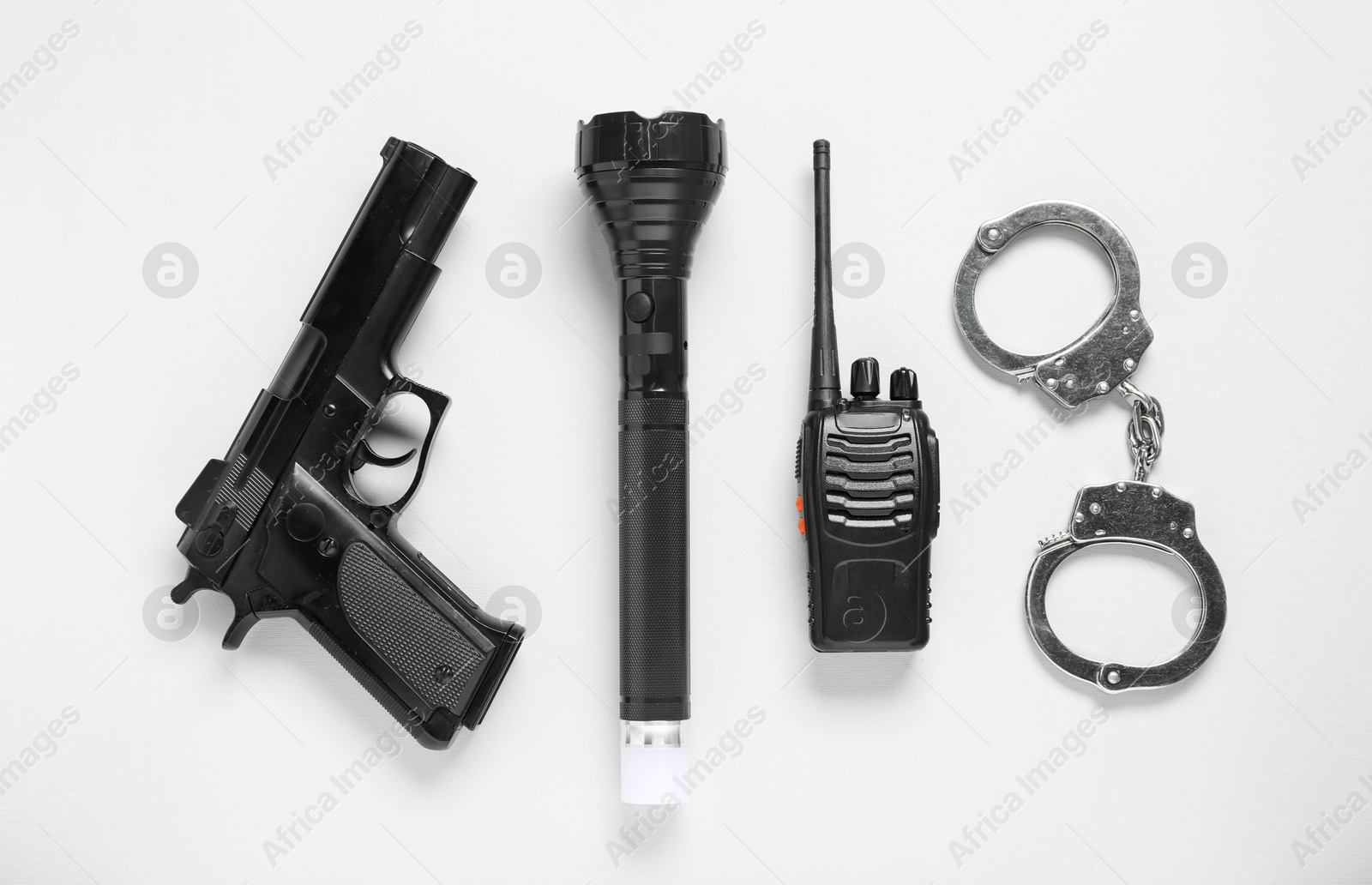 Different police equipment on white background, flat lay Photo of Different police equipment on white background, flat lay