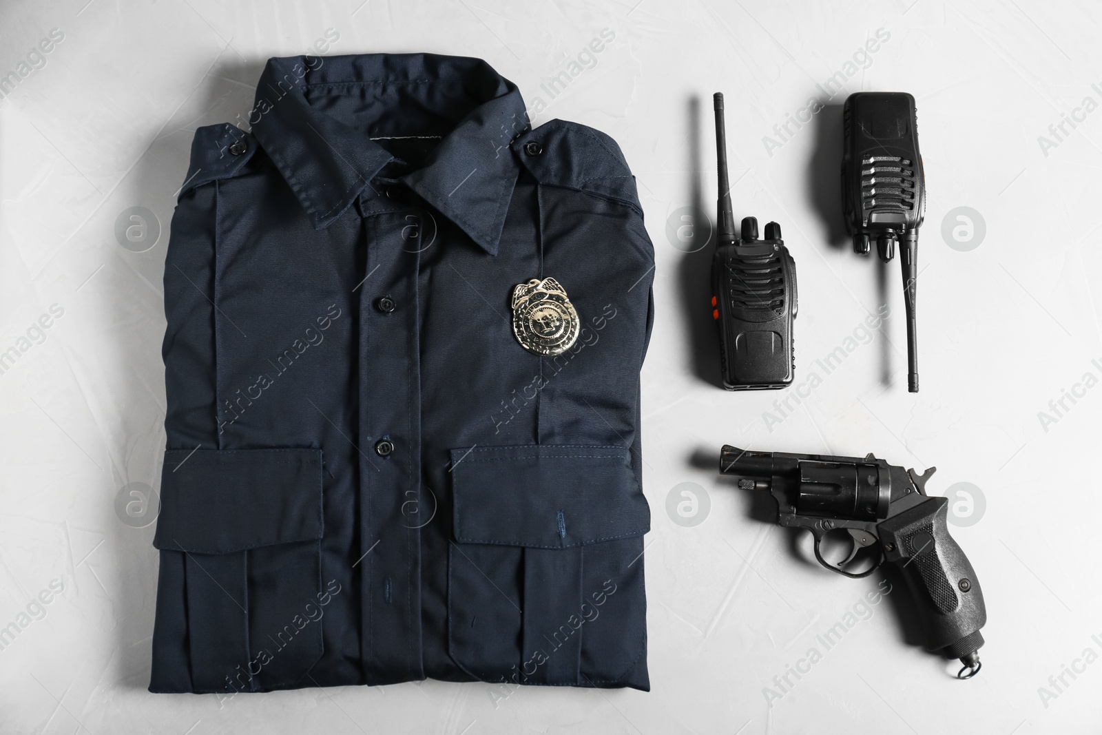 Different police equipment on white background, flat lay Photo of Different police equipment on white background, flat lay