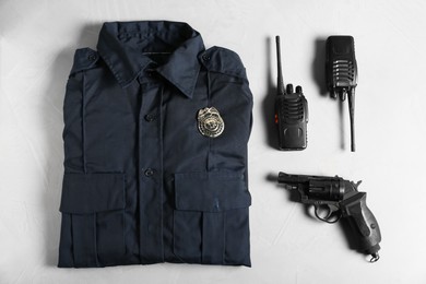 Photo of Different police equipment on white background, flat lay