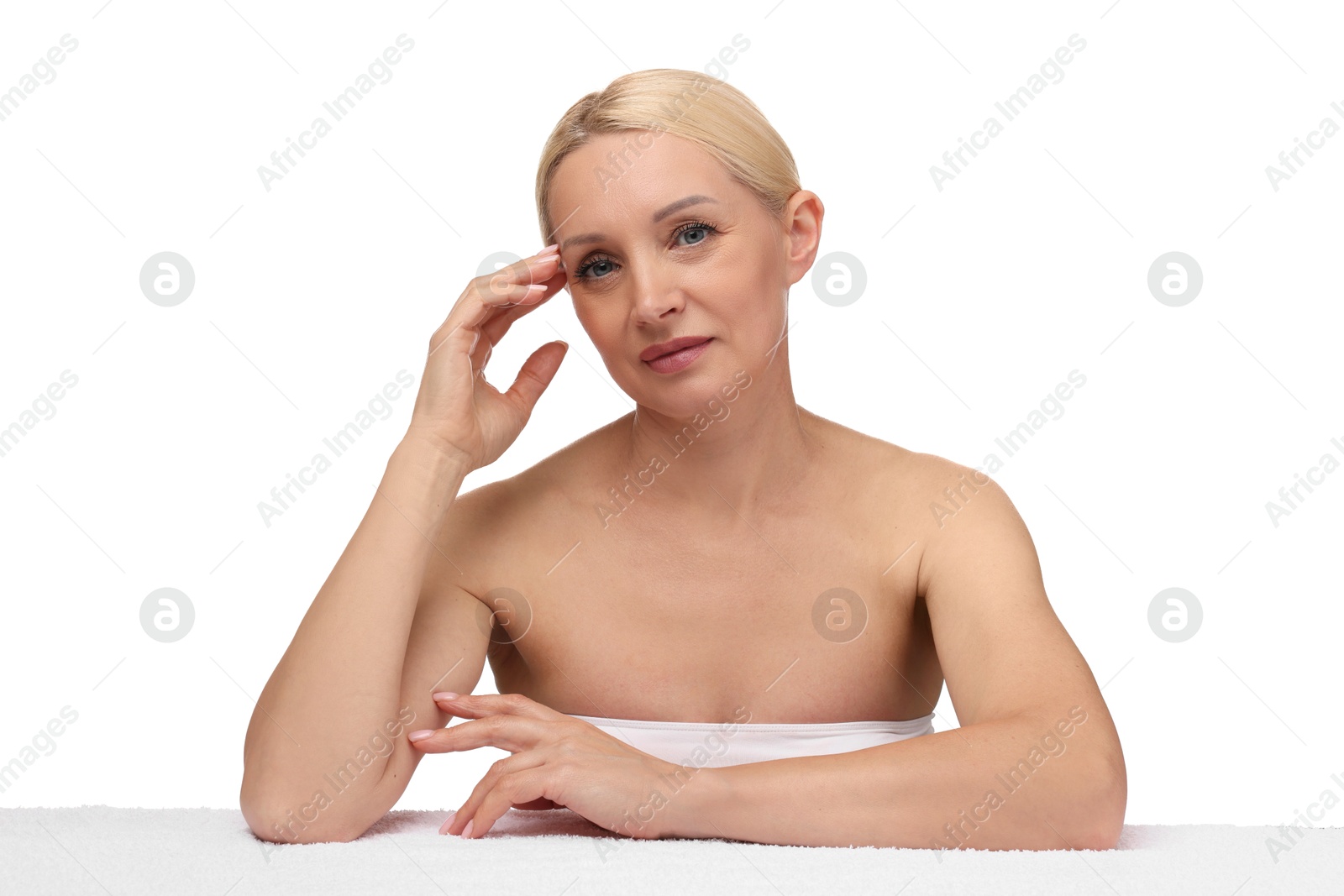 Portrait of beautiful woman with towel on white background Photo of Portrait of beautiful woman with towel on white background