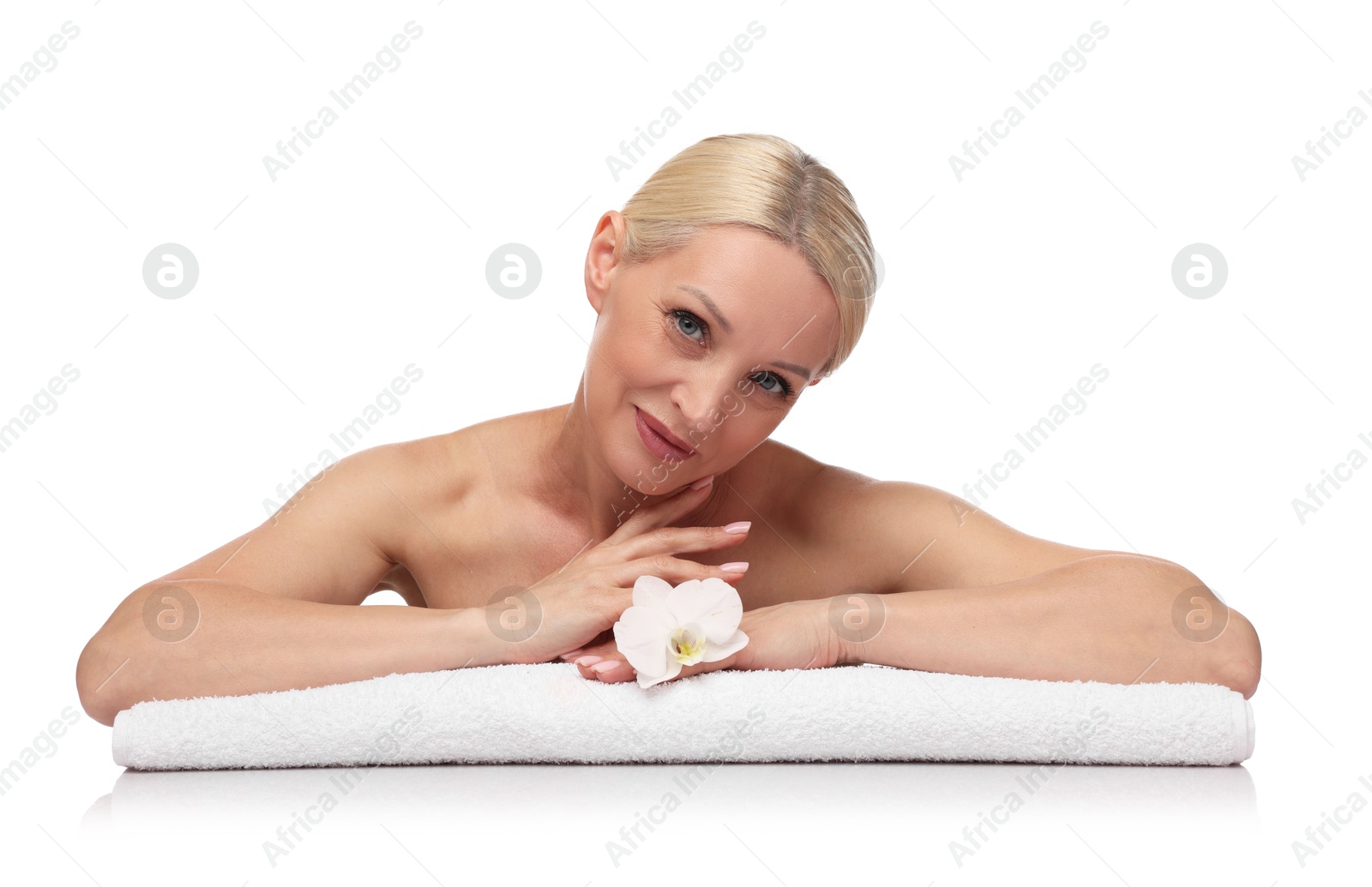 Beautiful woman with orchid flower and towel on white background Photo of Beautiful woman with orchid flower and towel on white background