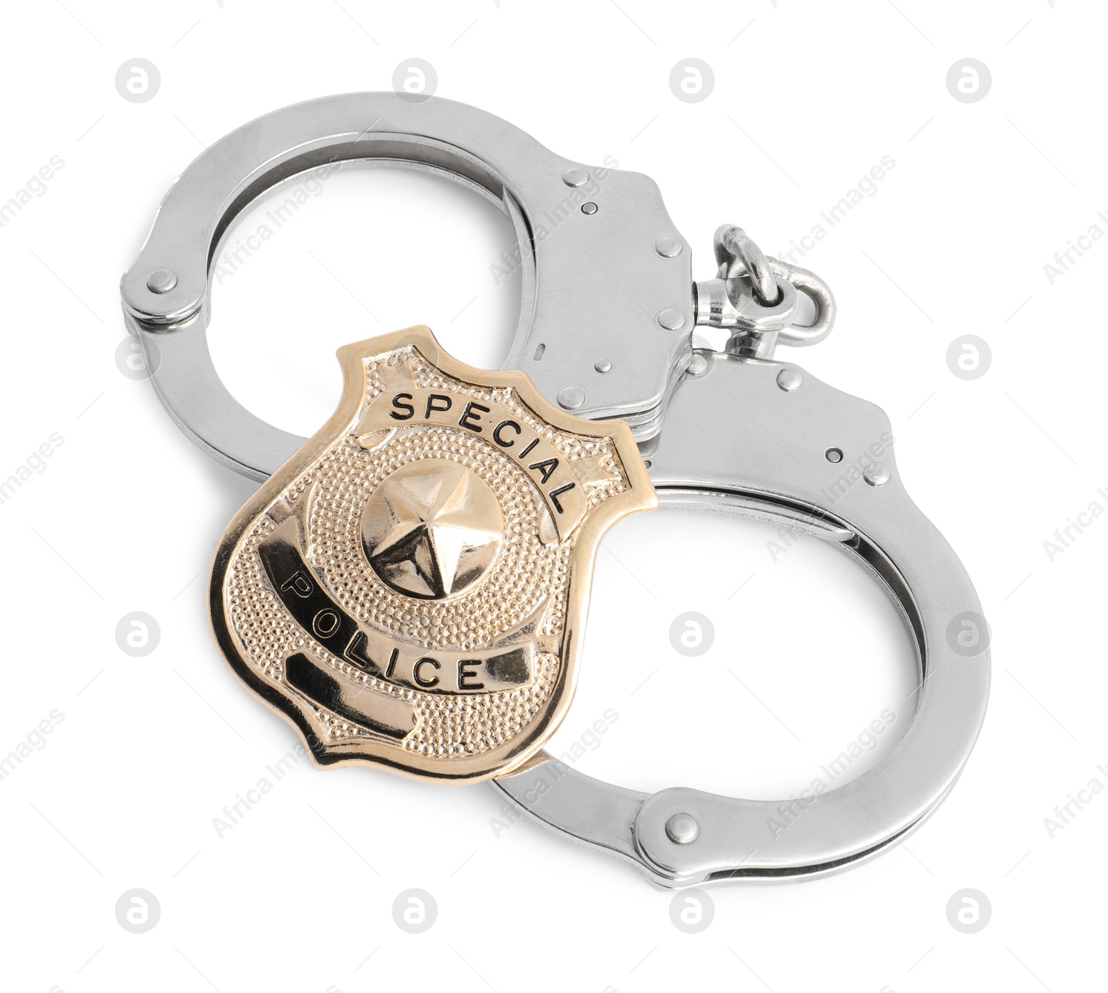 Police badge and handcuffs on white background, above view Photo of Police badge and handcuffs on white background, above view