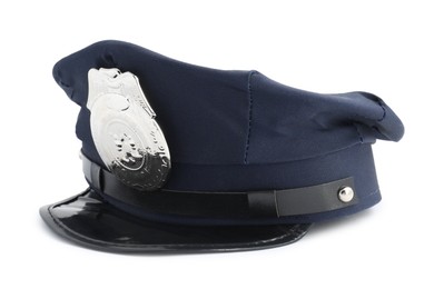 Photo of One dark blue police cap on white background